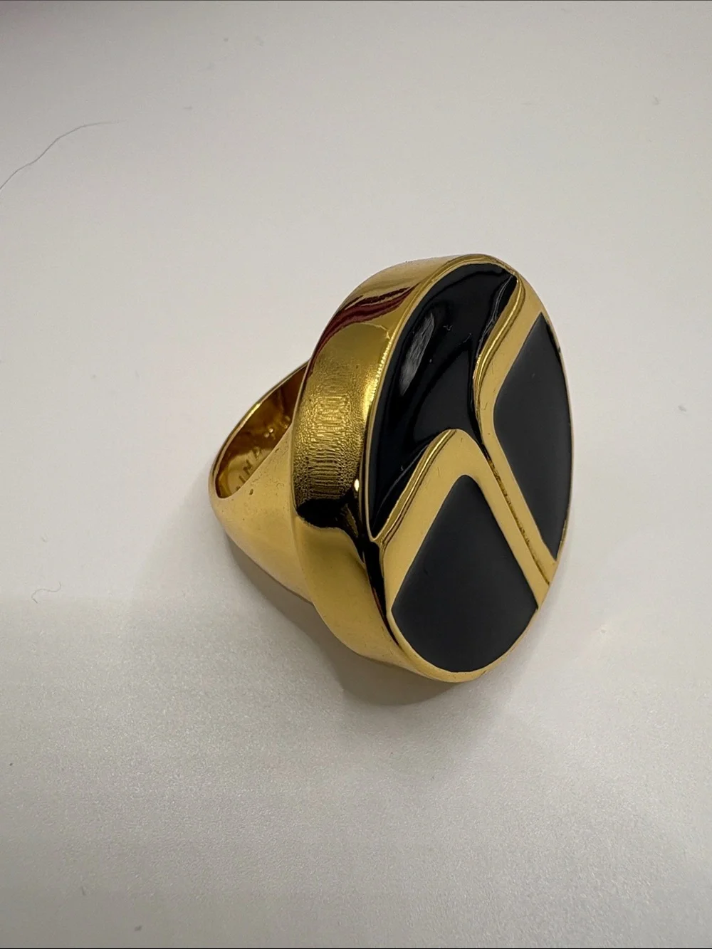 Trina Turk Gold Tone Ring with Black Enamel Initials Inlay